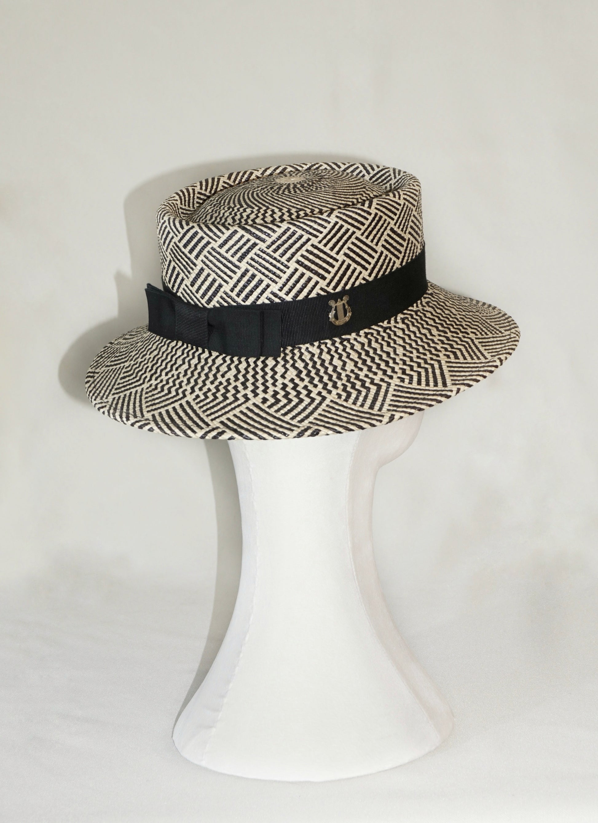 Leto Ode boater hat in Panama straw by Anna Xaniotaki, side and back view showing sterling silver lyre and double black bow