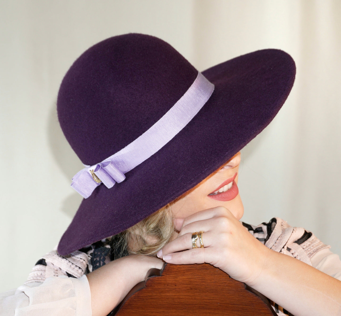 La Violette Nocturne Orchid Purple Felt Hat with Lavender Purple Double Bow & Gold Lyre by Anna Xaniotaki - three-quarter right view