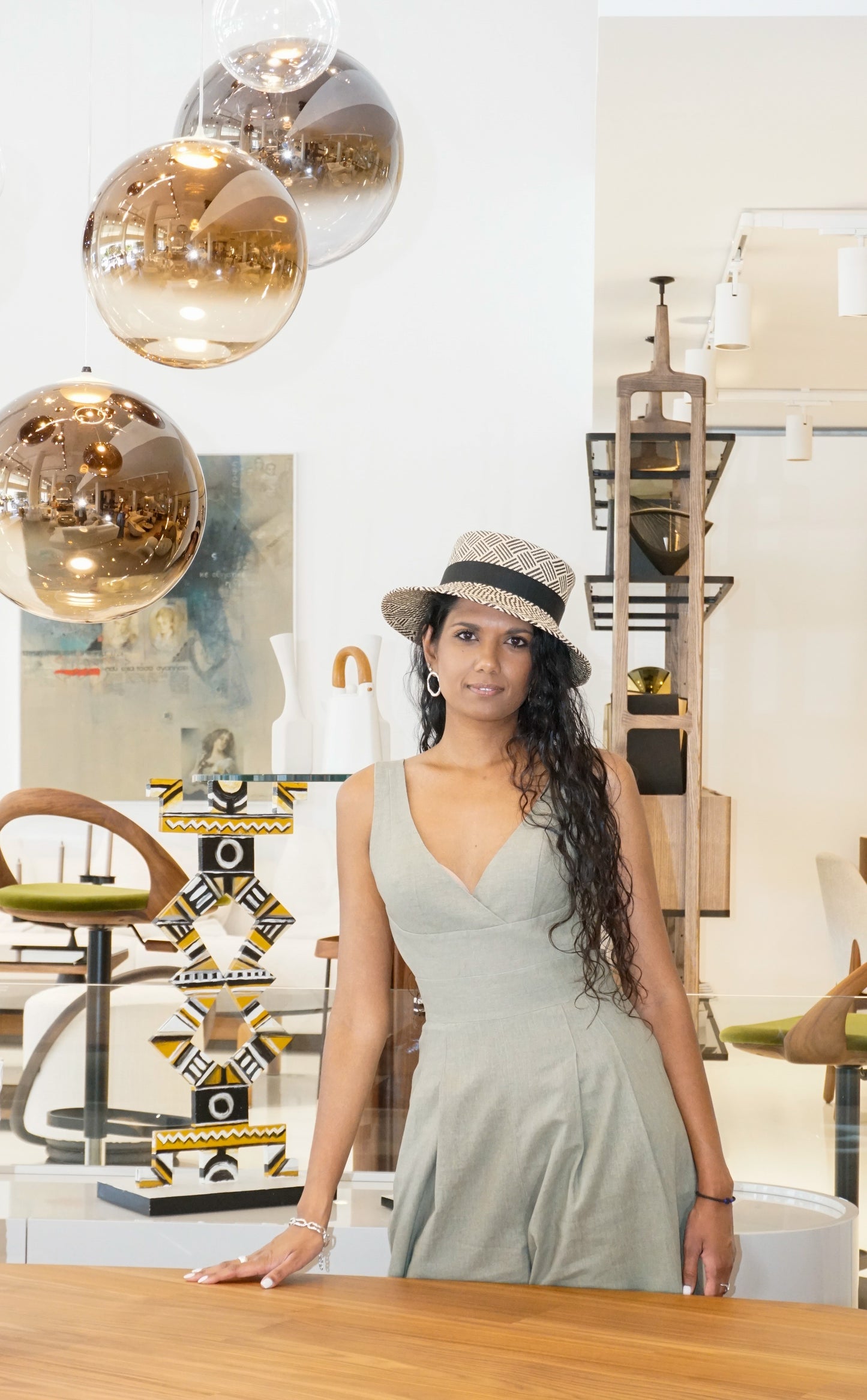 Leto Ode pale cream and black boater hat in Panama straw with black bow and sterling silver lyre by Anna Xaniotaki - front view