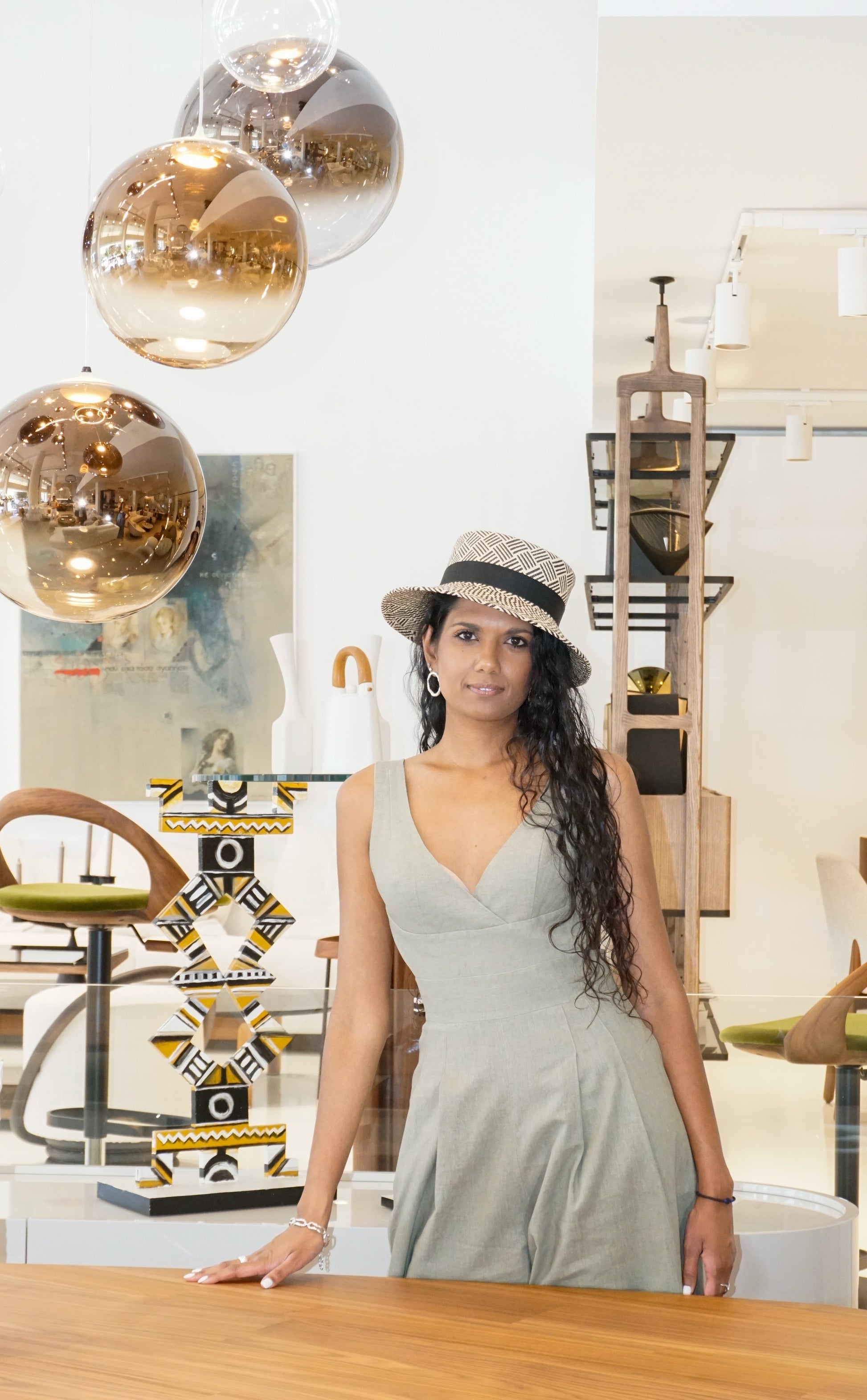 Leto Ode pale cream and black boater hat in Panama straw with black bow and sterling silver lyre by Anna Xaniotaki - front view