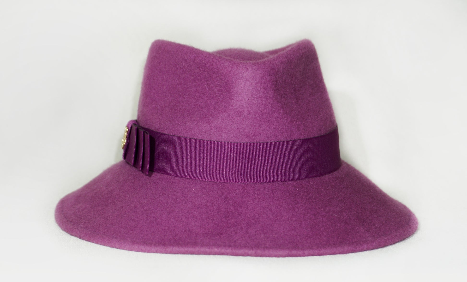 Amaryllis purple wool felt fedora hat with purple Italian cotton grosgrain ribbon band and Bow, front view. Bespoke Couture Millinery Anna Xaniotaki Atelier