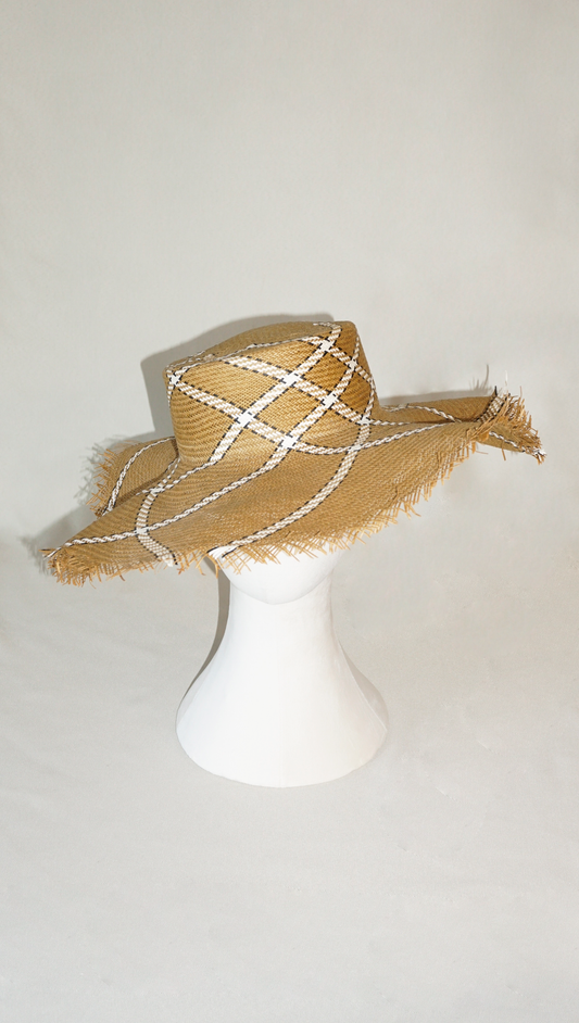Aura hand-woven wide brim hat, golden chestnut Toyo paper straw, ivory & black geometric plaid, bohemian sculptural presence, front view by Anna Xaniotaki