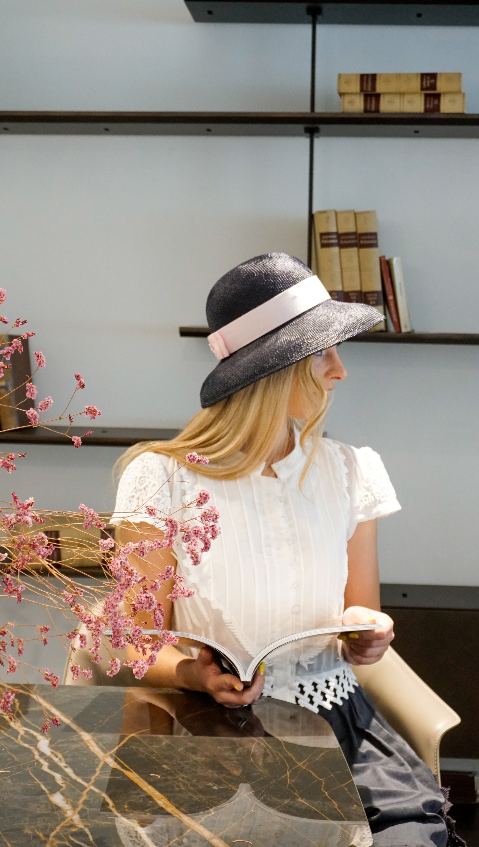 Isioni Ode navy blue viscose straw hat with pink double bow and sterling silver lyre by Anna Xaniotaki -  right side view