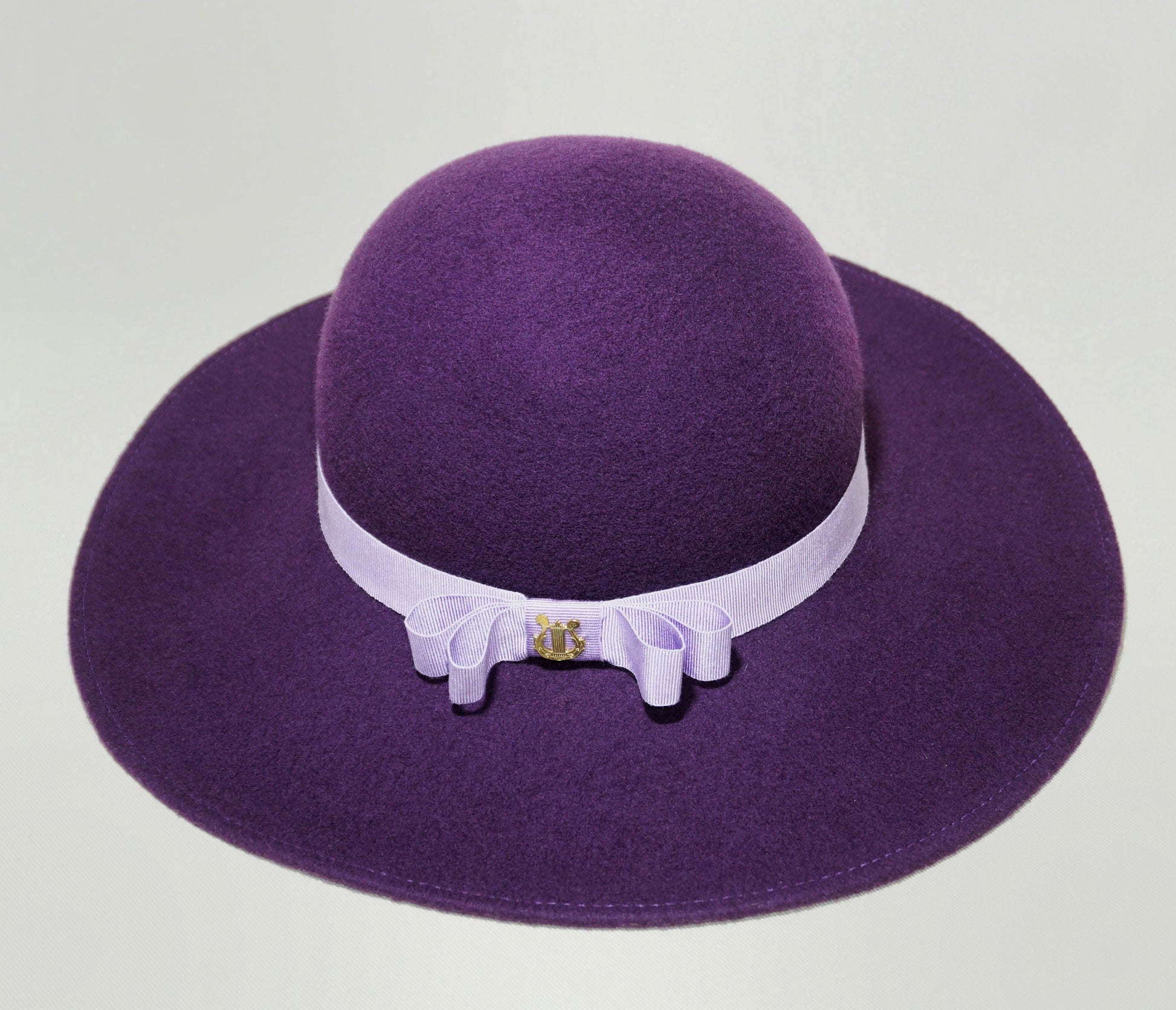 La Violette Nocturne Orchid Purple Felt Hat with Lavender Purple Double Bow & Gold Lyre by Anna Xaniotaki 