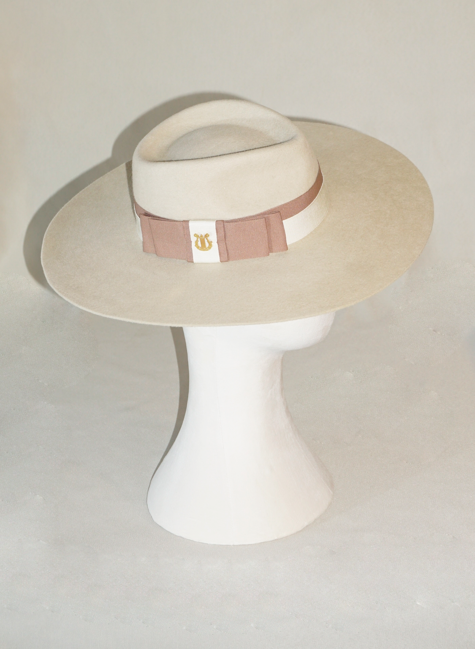 Iokasti Fedora Hat in Rabbit Fur Felt with Ivory and Nude Blush Italian Ribbon & 14ct gold plated 925 sterling silver lyre, right side view | Anna Xaniotaki Atelier
