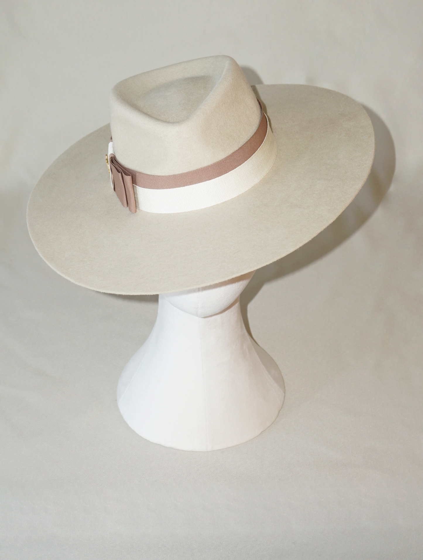 Iokasti Fedora Hat in Rabbit Fur Felt with Ivory and Nude Blush Italian Ribbon & 14ct gold plated 925 sterling silver lyre, front top view | Anna Xaniotaki Atelier
