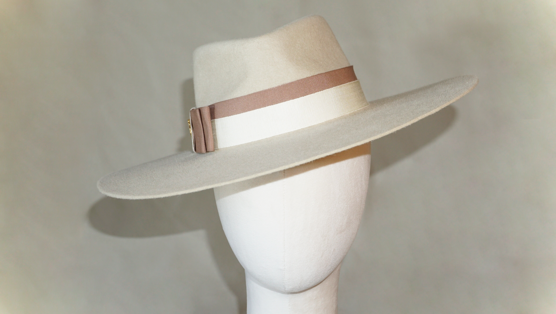 Iokasti Fedora Hat in Rabbit Fur Felt with Ivory and Nude Blush Italian Ribbon & 14ct gold plated 925 sterling silver lyre, close front view | Anna Xaniotaki Atelier