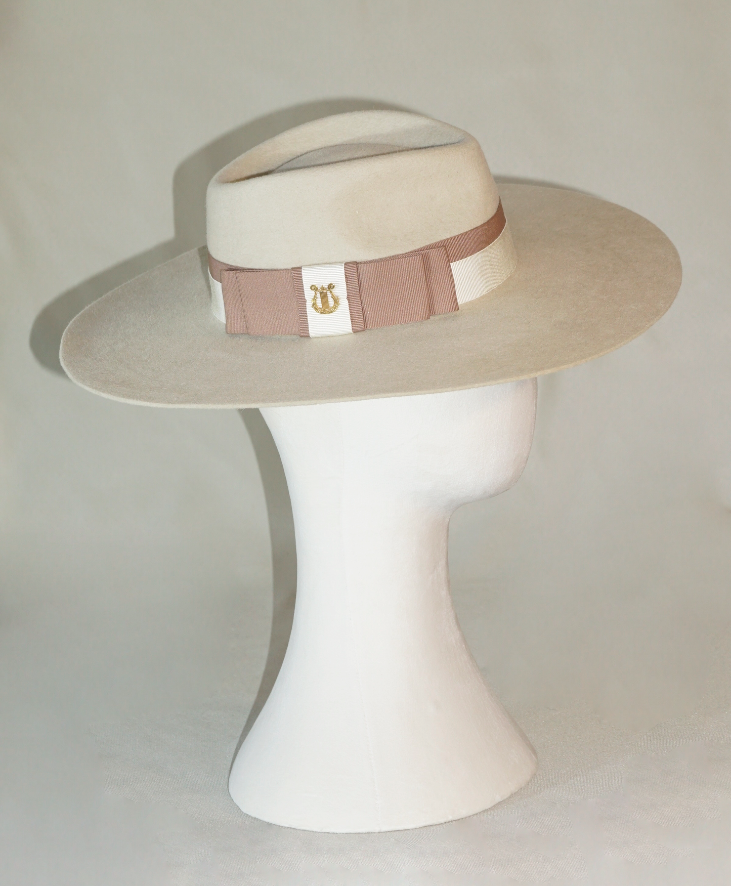 Iokasti Fedora Hat in Rabbit Fur Felt with Ivory and Nude Blush Italian Ribbon & 14ct gold plated 925 sterling silver lyre, bow and lyre detail, right side view | Anna Xaniotaki Atelier