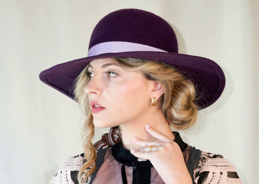 La Violette Nocturne Orchid Purple Felt Hat with Lavender Purple Double Bow & Gold Lyre by Anna Xaniotaki - left side view