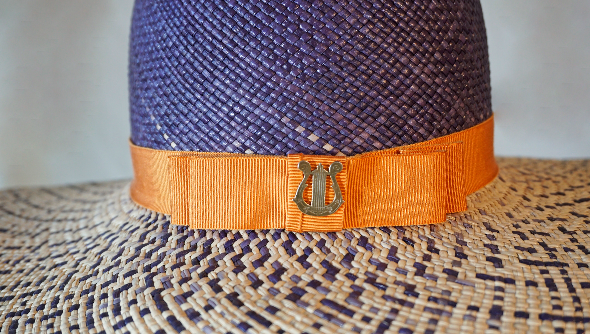 Lyra Soleil Panama Straw Hat in Navy, Natural & Gold Lyre by Anna Xaniotaki, Gold lyre detail