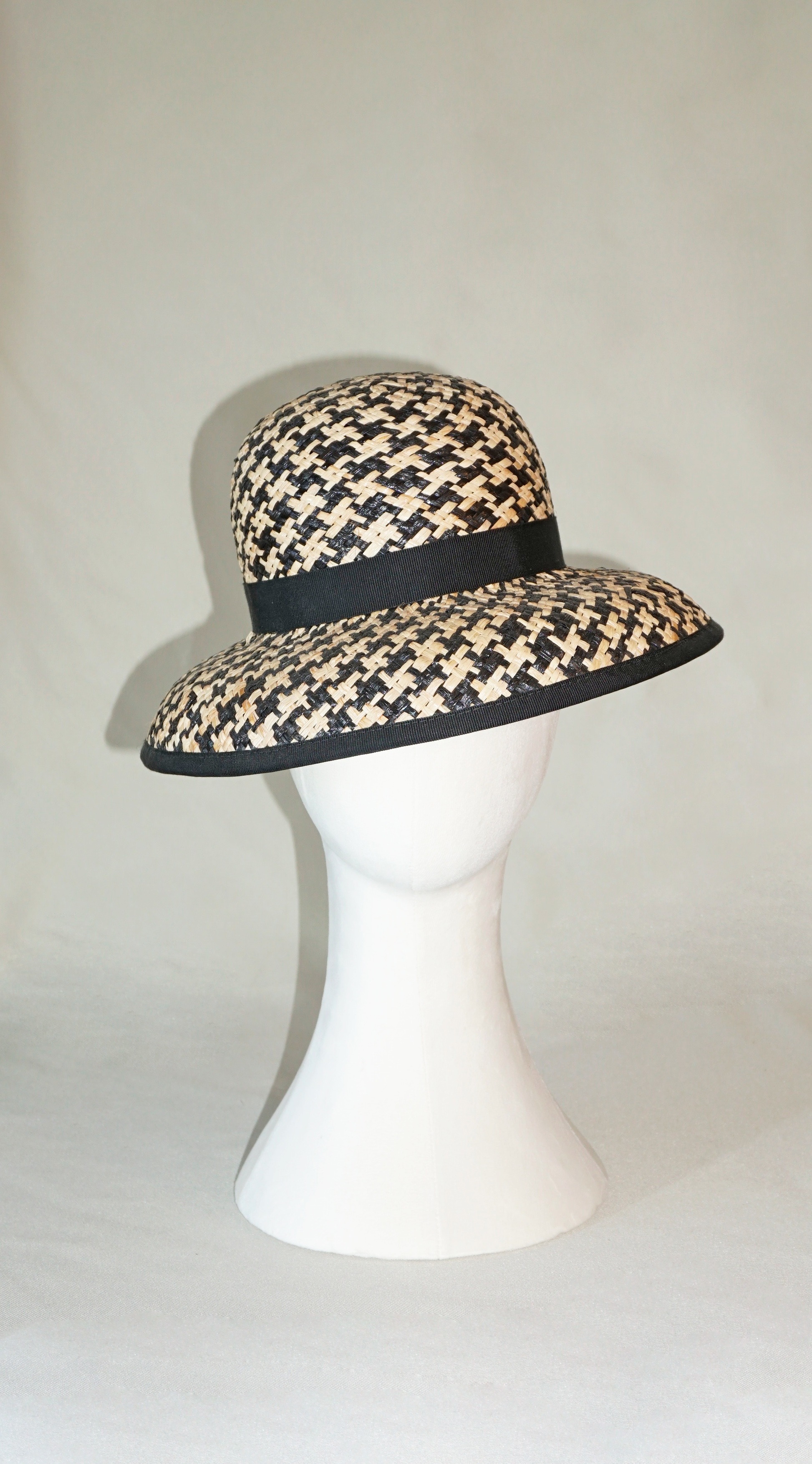 Melia Hat in Black & Natural Raffia Straw by Anna Xaniotaki front view
