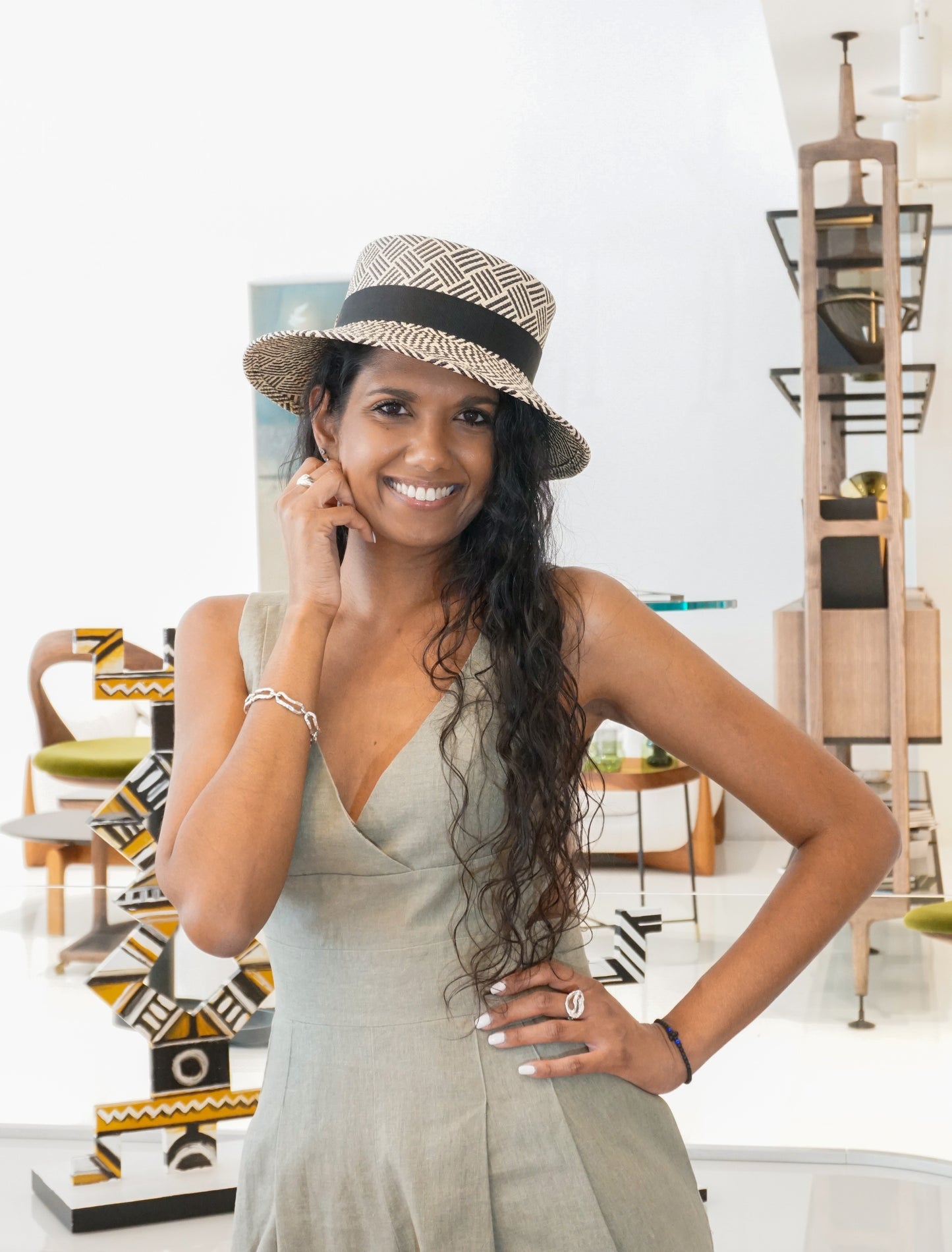 Leto Ode boater hat in Panama straw with black bow and sterling silver lyre by Anna Xaniotaki - front view